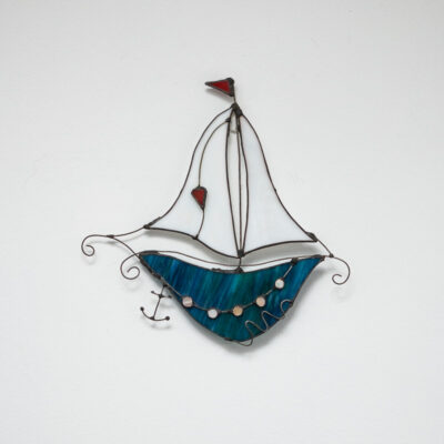 Fantasy boat turquoise with white sail