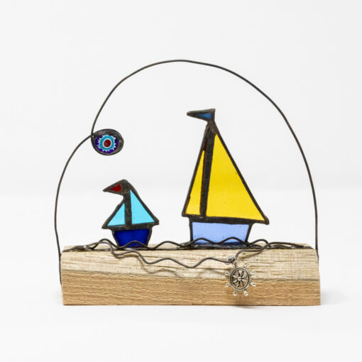 Sailing boat duo on wood