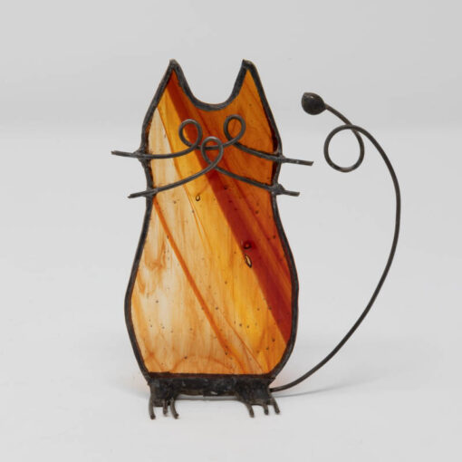 Cat sculpture in orange stained glass